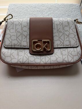 Calvin Klein White & Brown Monogram Crossbody Bag with Gold CK Logo good to go!